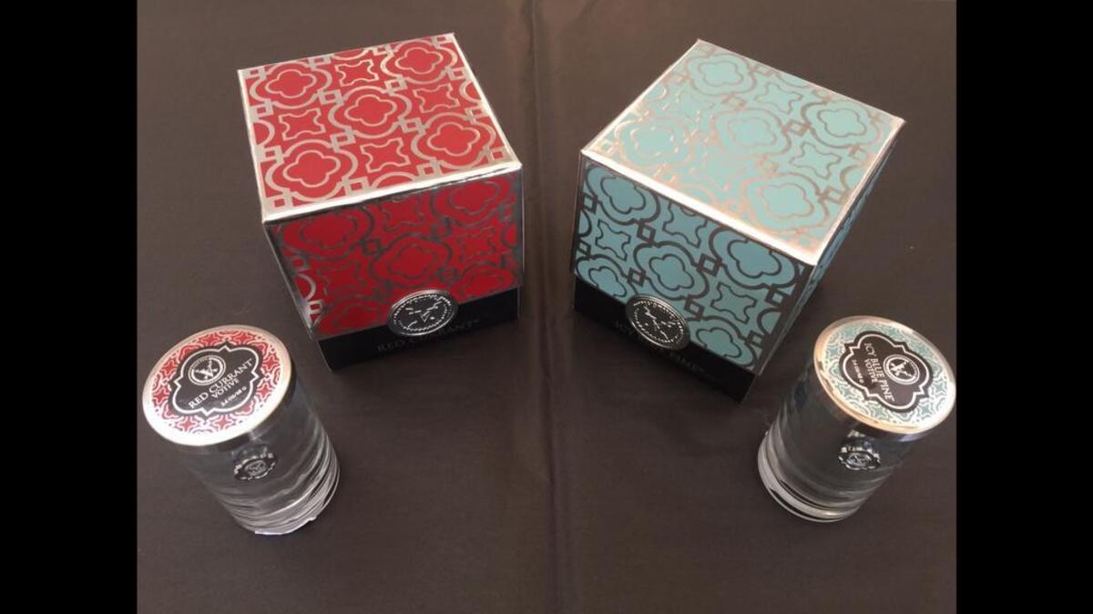 Votivo icy blue pine candle and red currant candle from Fab’rik.