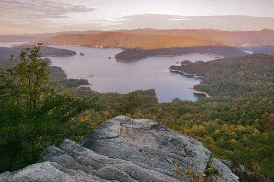 The 7,565-acre Lake Jocassee — formed by the Whitewater, Thompson, and Toxaway rivers — is surrounded by mountains and has four major waterfalls. This is the view from Jumping-Off Rock.