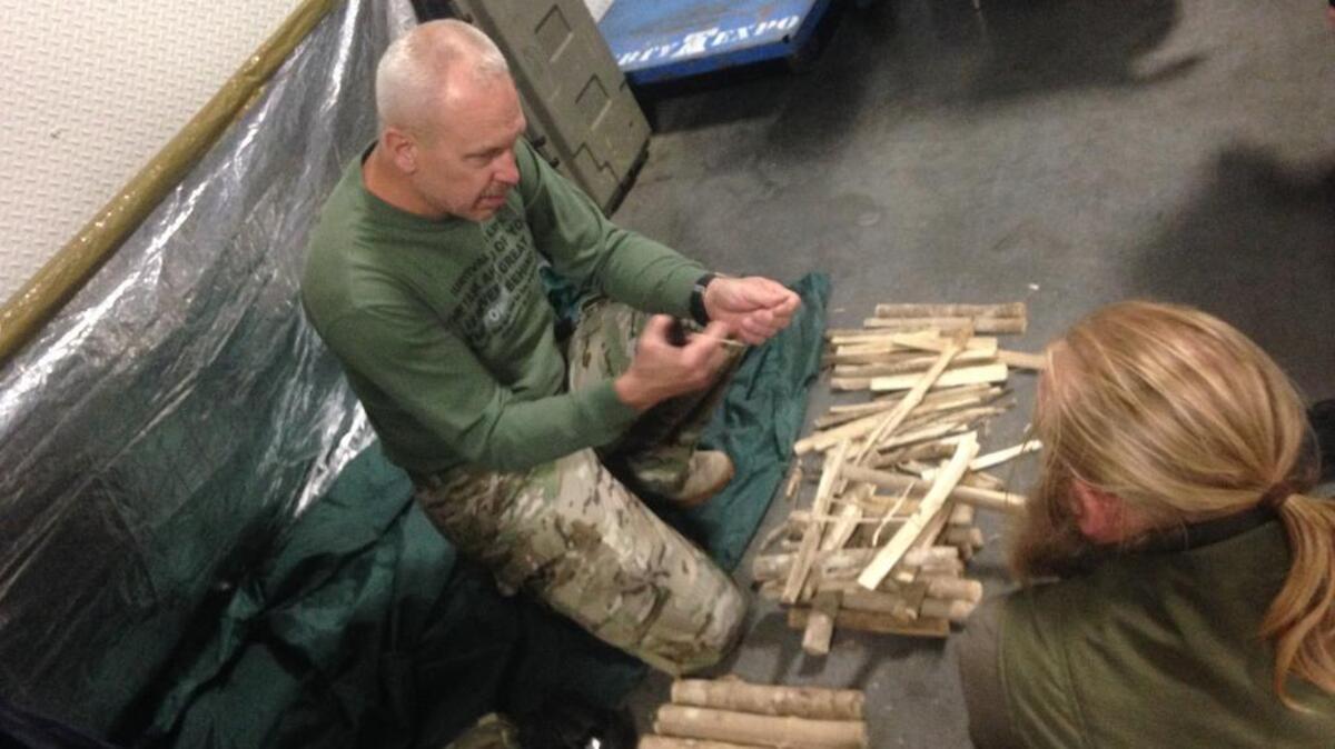 Joe Fischer, a wilderness survival expert and firefighter from Tennessee, demonstrates how to build a proper fire.
