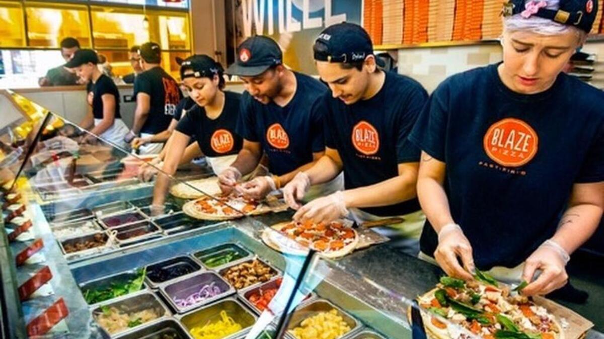 Customers can build their own pizzas by making selections from three sauces, nine types of cheeses, eight types of meat, 19 veggies and four finishing sauces.