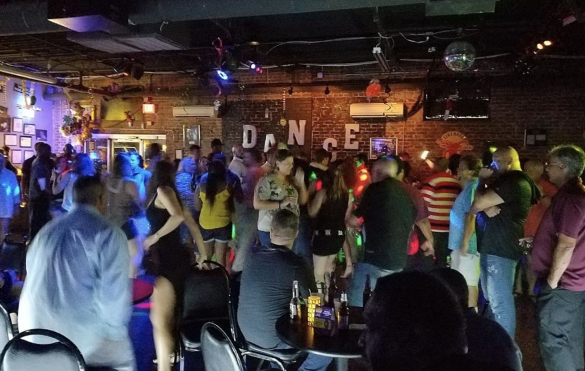 The Woody’s dance floor scene.
