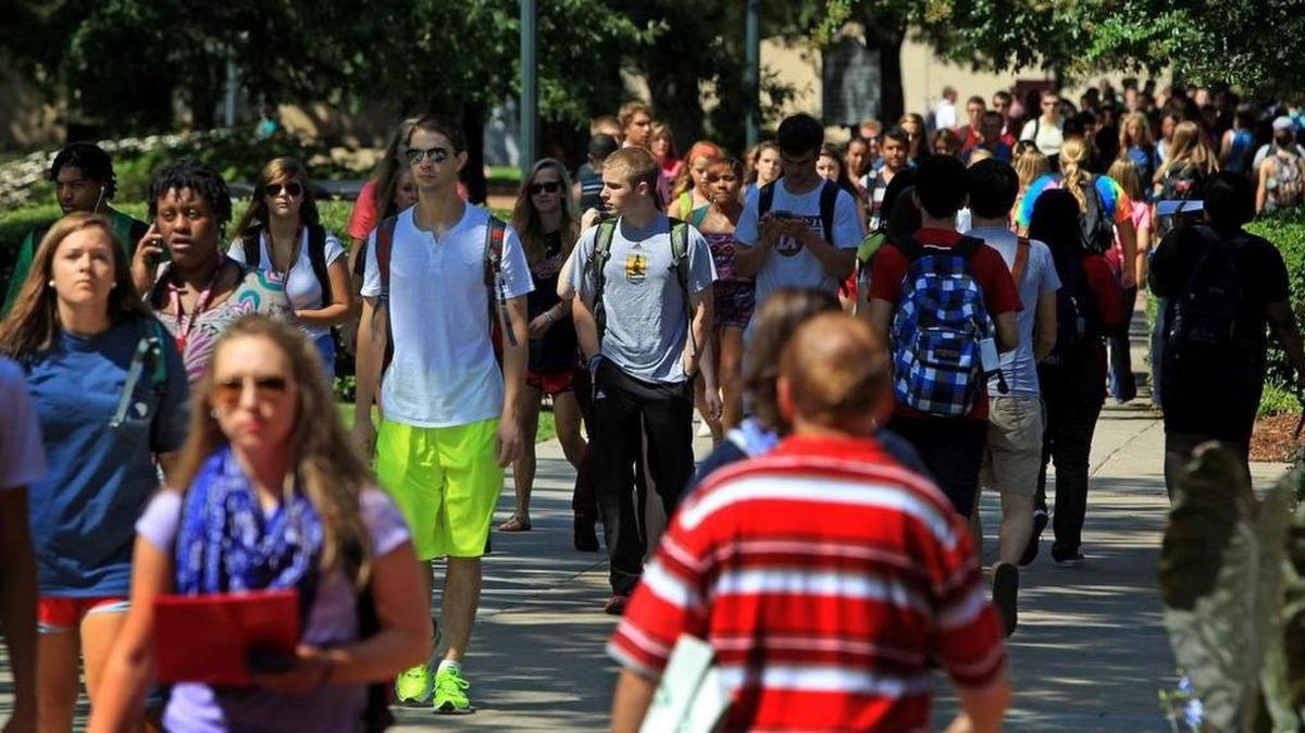 USC students make their way pass Russell House on campus.