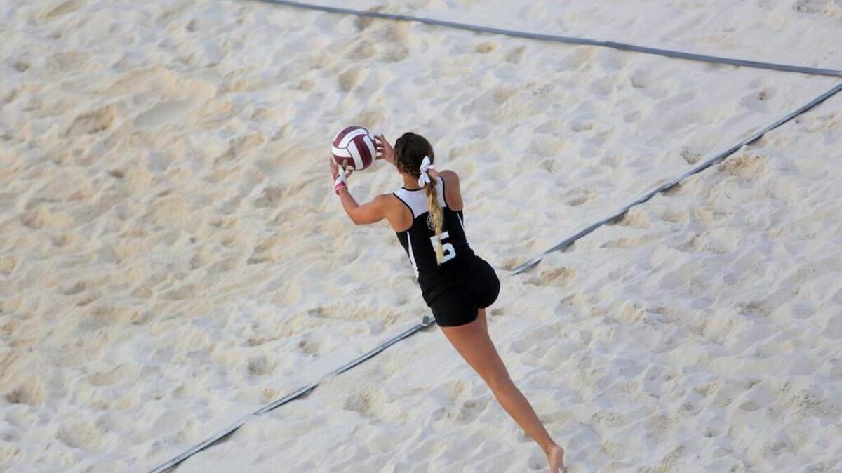 South Carolina’s Chynna Ratner serves.