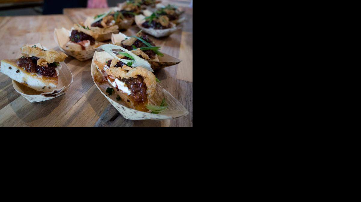 
Bone-in Artisan Chef Scott Hall's dish for Slow Food at Indie Grits "Sustainable Chefs Showcase” 2014.
