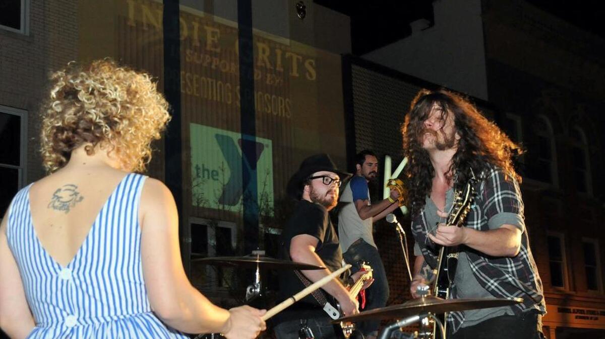 The Columbia band Say Brother, shown here in a 2013 performance –From left dummer Jessica Oliver, Joe Roberts on bass, Joshua Michael on tambourine and Tripp LaFrance on guitar.