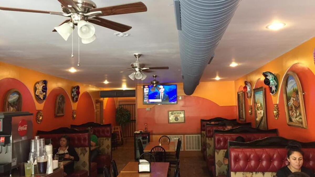 At Moctezumas Taqueria, bright colors are the backdrop to painted, framed scenes of Mexican villages and landscapes as well as a collection of elaborate Mexican hats.