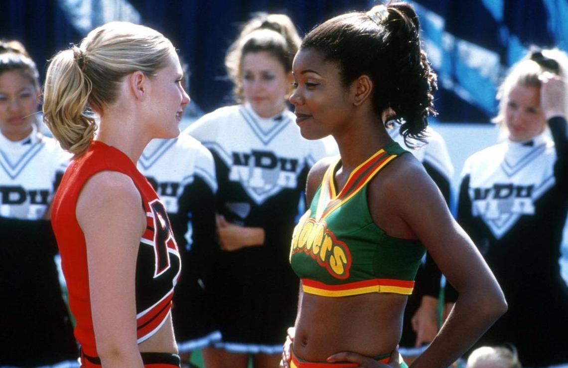 Torrance (Kirsten Dunst) and Isis (Gabrielle Union), captains of rival cheerleading teams, face off at the national championship in “Bring It On.”