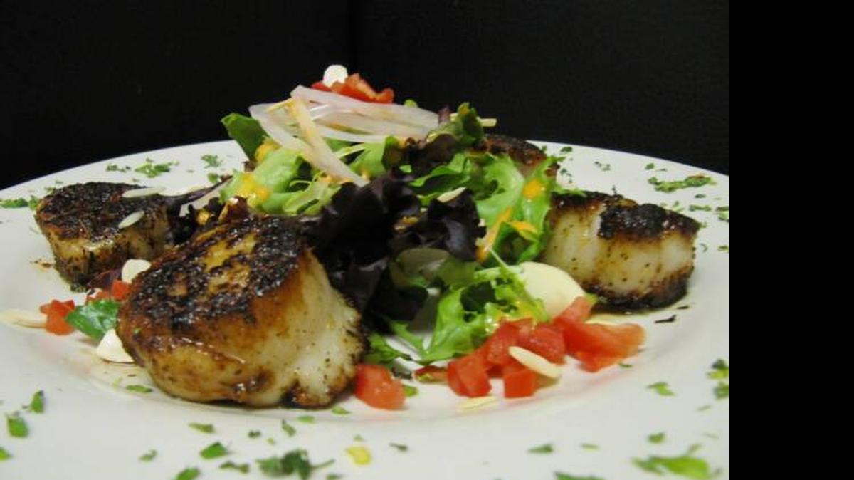 
Pan-seared scallops appetizer at Alodia’s 

