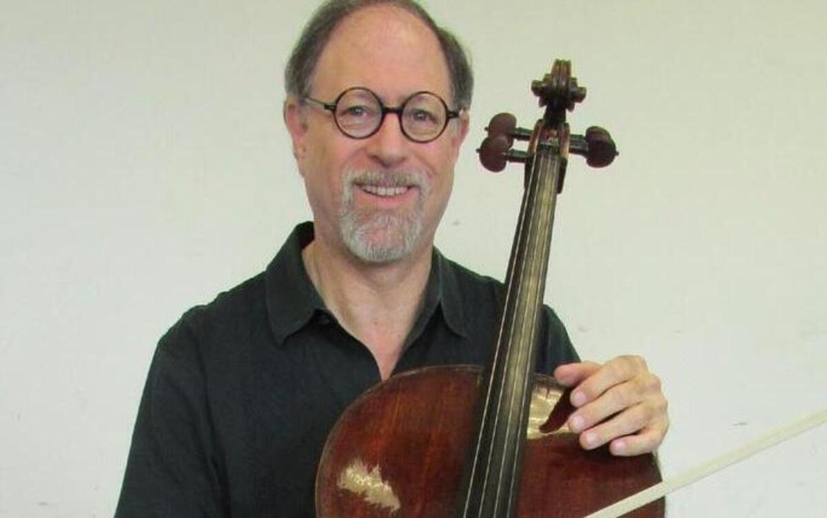 Dr. Robert Jesselson and his 300-year-old Jacques Boquay cello.