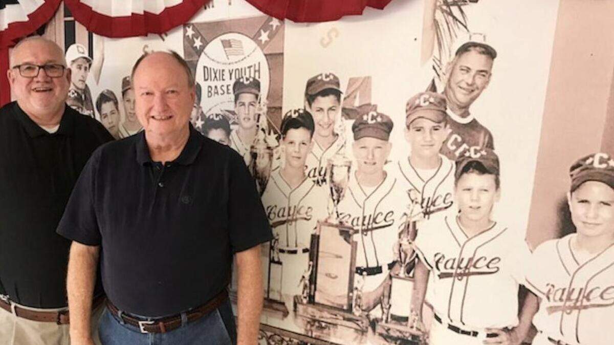 Delmar Faust & Randy Stewart view baseball exhibit.