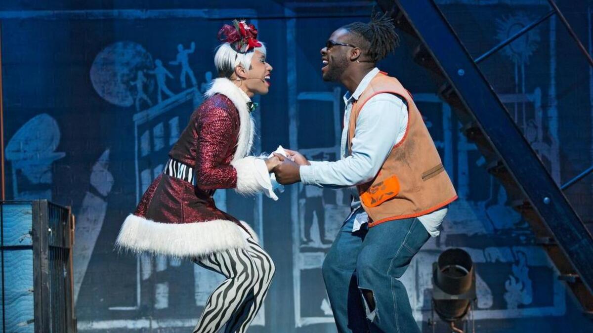 Aaron Alcaraz and Aaron Harrington are shown in a scene from “Rent,” playing Wednesday, April 25, and Thursday, April 26, at the Koger Center for the Arts.