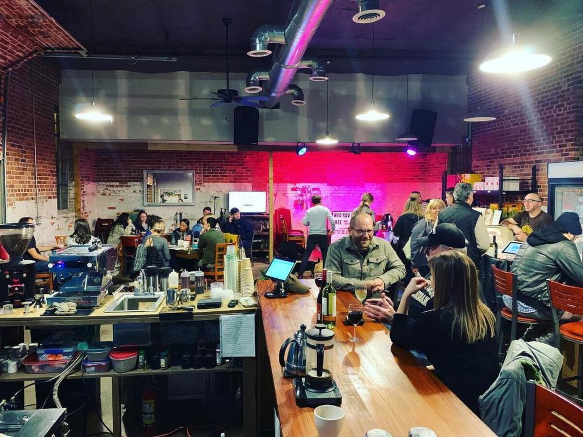 A look into Curiosity Coffee Bar’s new performance stage and dining area.