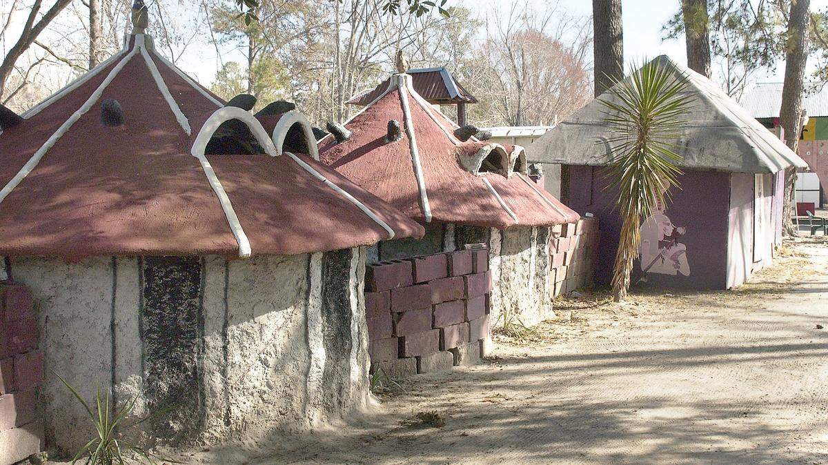 Homes are African-style stucco huts with cinder-block walls in the Oyotunji African Village in Sheldon. Many residents try to keep life very simple, the village’s king, Oba Adefunmi II, told the Beaufort Gazette in 2009.