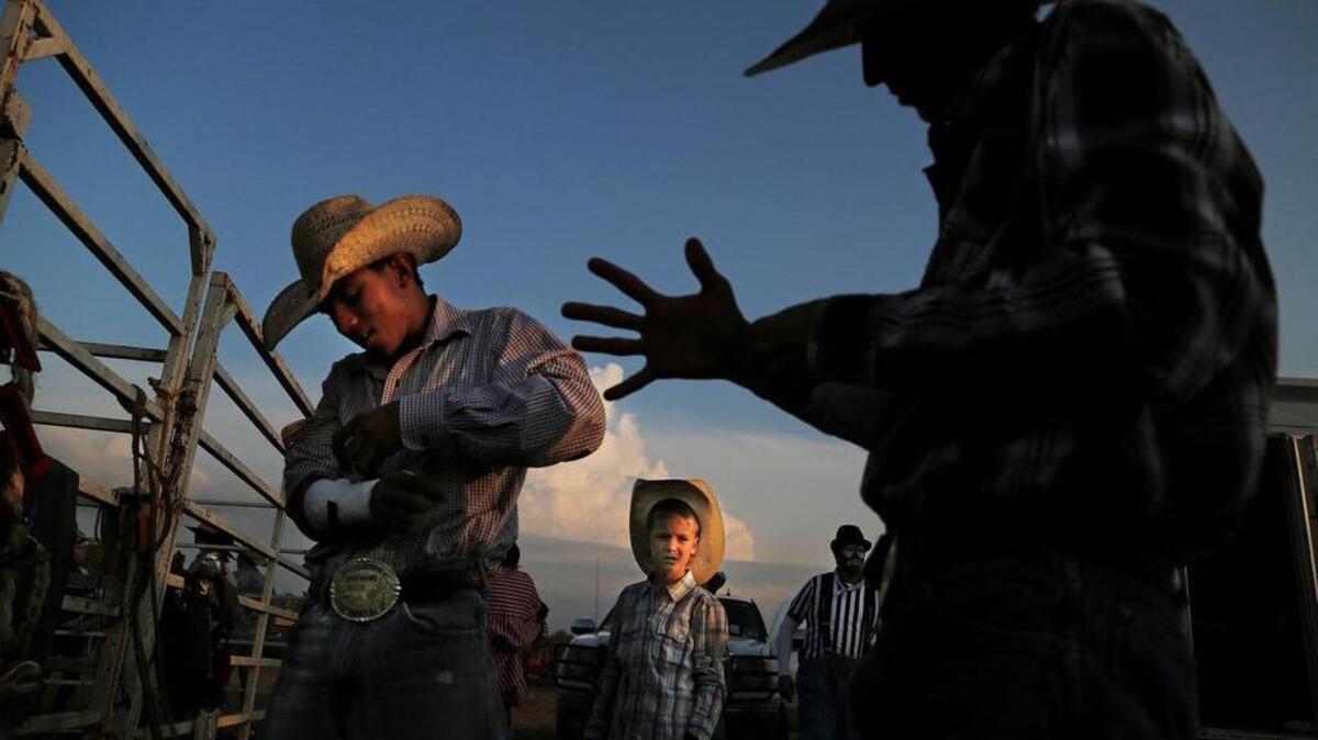 Cowboys prepare for their events at a past Blythewood DOKO Rodeo.
