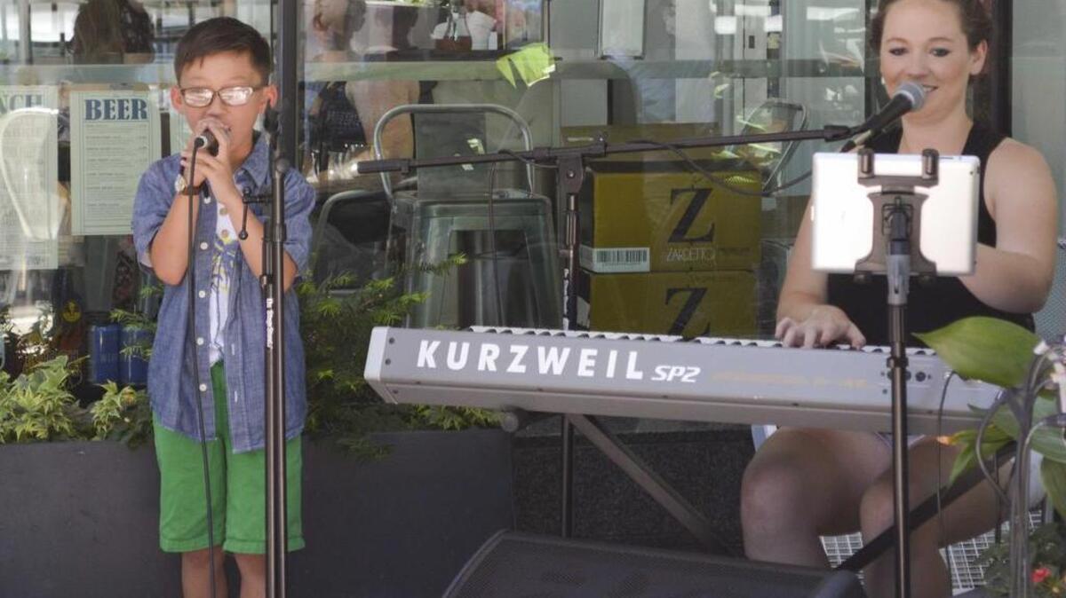 Two musicians perform during Make Music Columbia 2015.
