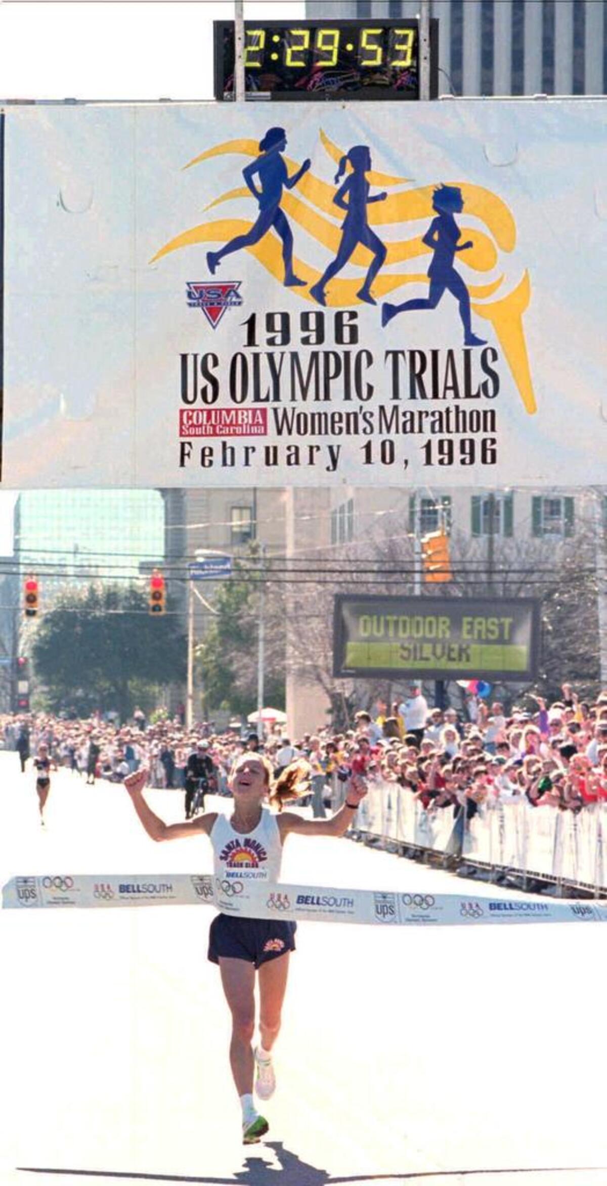 Jenny Spangler crosses the finish line to win the U.S. Women’s Olympic Marathon Trials in 1996.