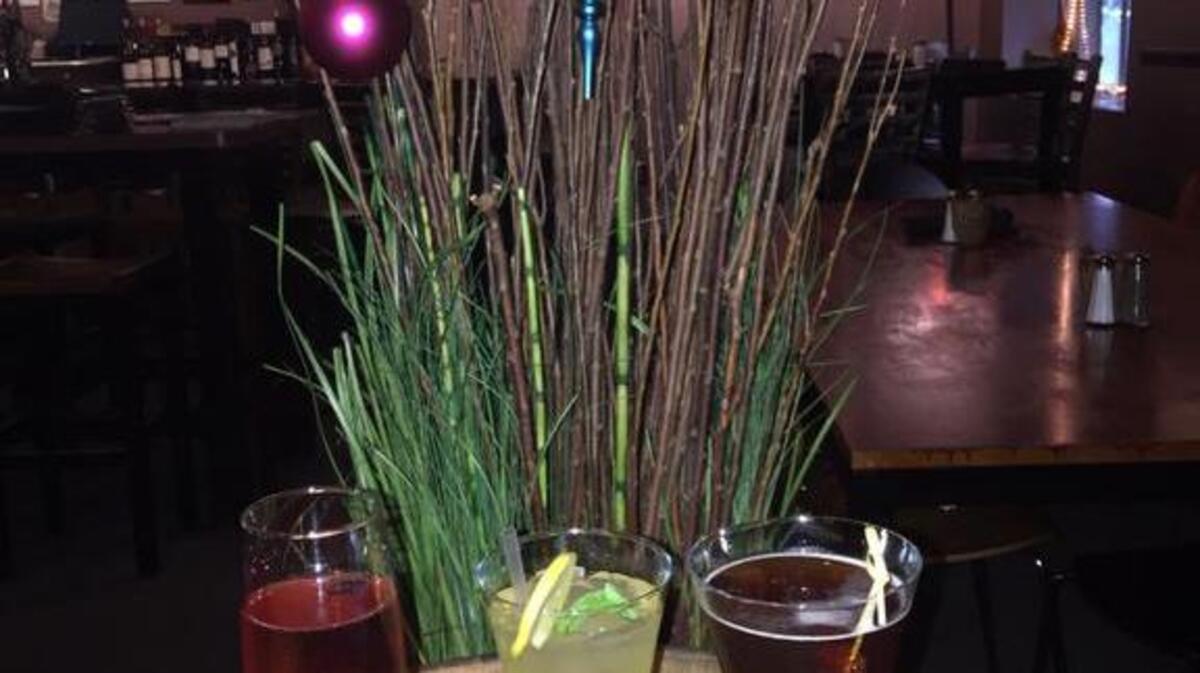 Champagne cocktails from Cellar on Greene, from left, include the Poinsetta, Bee’s Knees and “Kirsch” Royale.