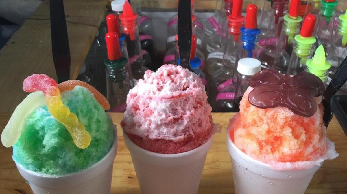 
From left, Gone Fishin’ (polar punch and lemon lime with gummy worms), strawberry cheesecake with a marshmallow topping, and Butterfly Kiss (cotton candy and birthday cake with a butterfly gummy).
