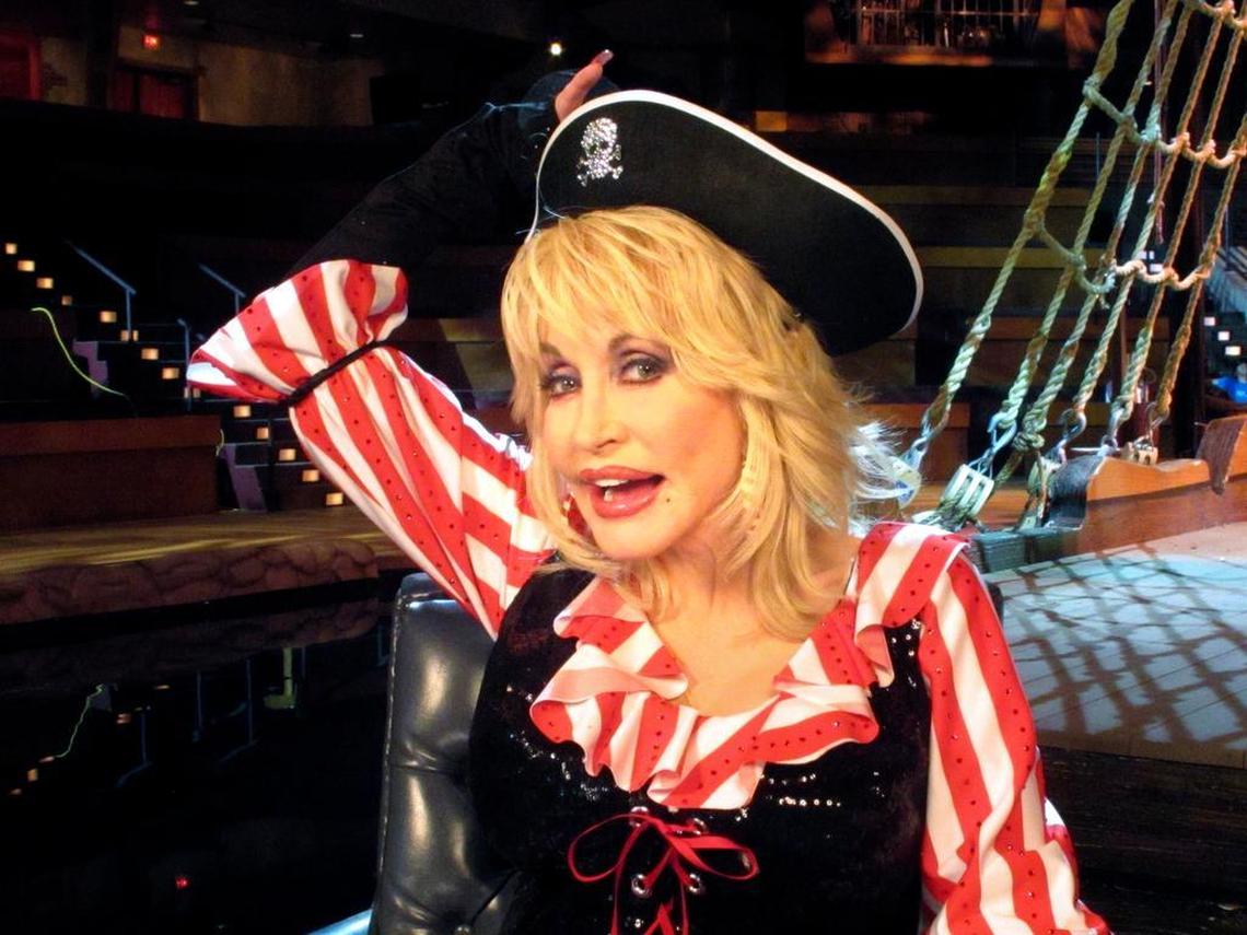 This Friday, June 3, 2011 photo shows singer Dolly Parton as she poses for a photograph during an interview at her Pirates Voyage dinner theater in Myrtle Beach, S.C. The theater, which replaces her western-themed Dixie Stampede, is expected to open this weekend.