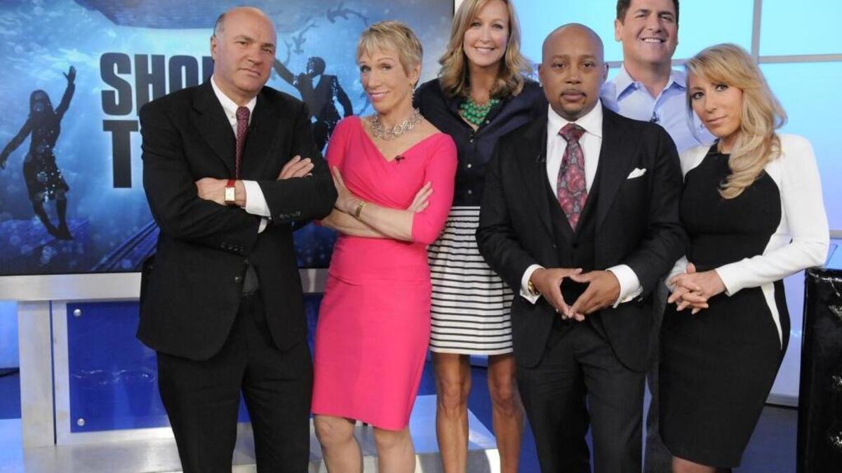 This undated photo provided by ABC shows "Shark Tank" moguls, from left, Kevin O'Leary, Barbara Corcoran, Lara Spencer, Daymond John, Mark Cuban and Lori Greiner.