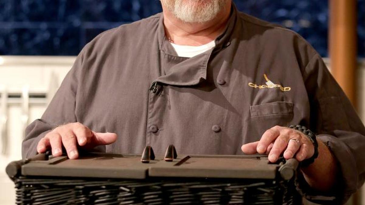 JR Tiger on the Food Network show “Chopped: Truck Stop Stars” with a basket full of “mystery ingredients” he used to win the competition and $10,000.