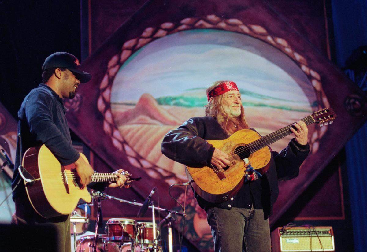 Willie Nelson and Darius Rucker during the Farm Aid concert at Williams-Brice Stadium on Oct. 12, 1996.