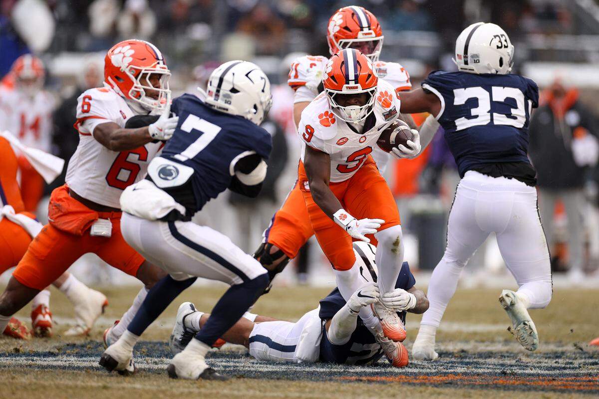 Gideon Davidson #9 of the Clemson Tigers carries the ball in the second quarter against the Penn State Nittany Lions during the 2025 Bad Boy Mowers Pinstripe Bowl at Yankee Stadium on December 27, 2025 in New York City. 