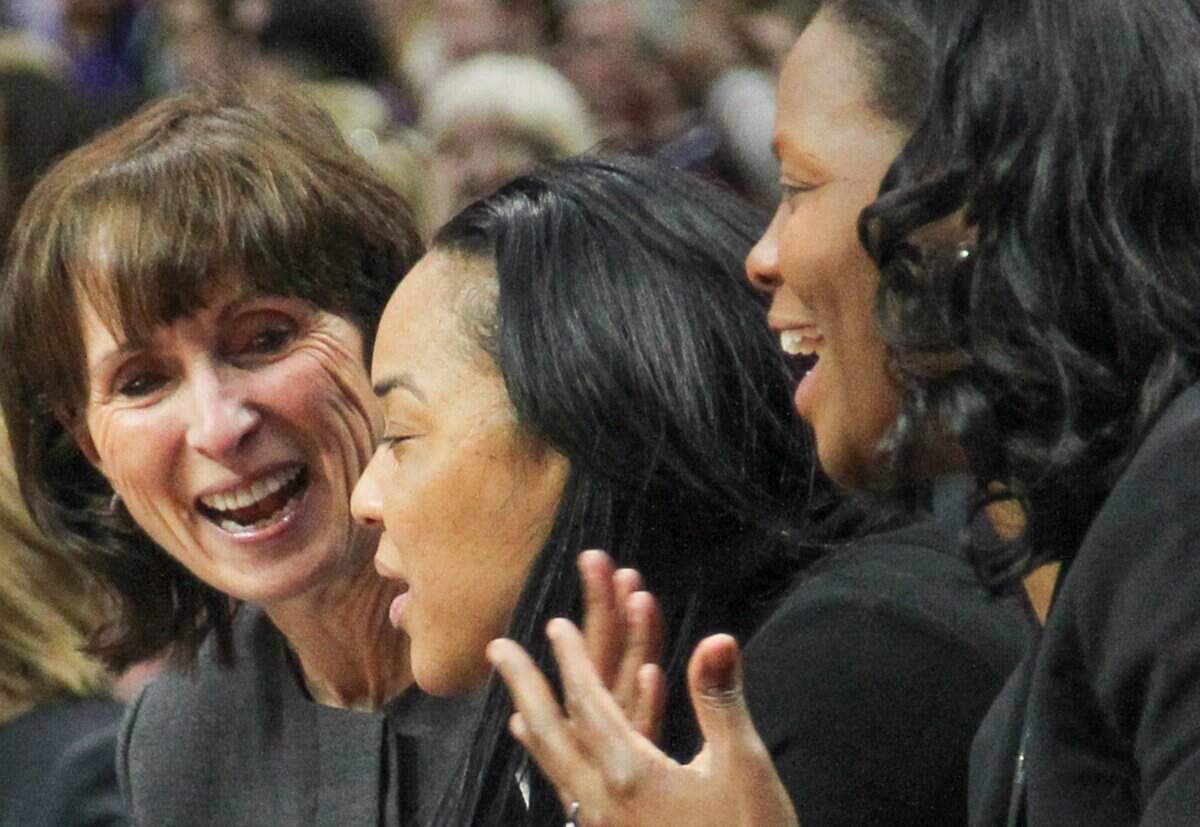 Dawn Staley with assistant coaches Lisa Boyer (left) and Nikki McCray-Penson (right) at the NCAA national championship in Dallas on April 2, 2017. 