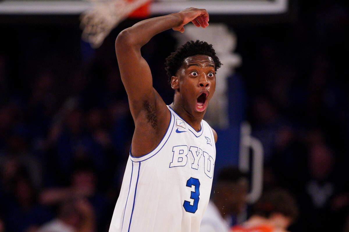 NEW YORK, NEW YORK - DECEMBER 09: AJ Dybantsa #3 of the BYU Cougars reacts after teammate Keba Keita #13 dunked against the Clemson Tigers in the second half at Madison Square Garden on December 09, 2025 in New York City.