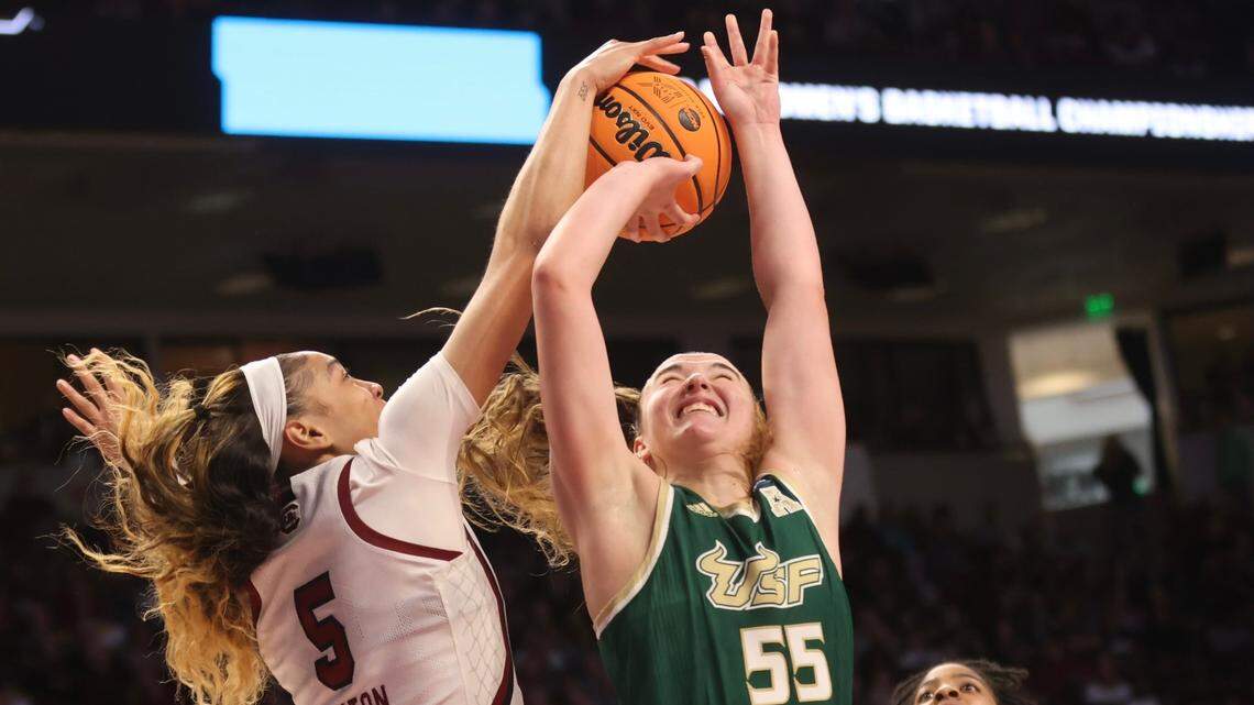 South Carolina forward Victaria Saxton (5) blocks the shot of South Florida wing Carla Brito (55) during a second round NCAA Tournament game on March 19, 2023, at Colonial Life Arena in Columbia.