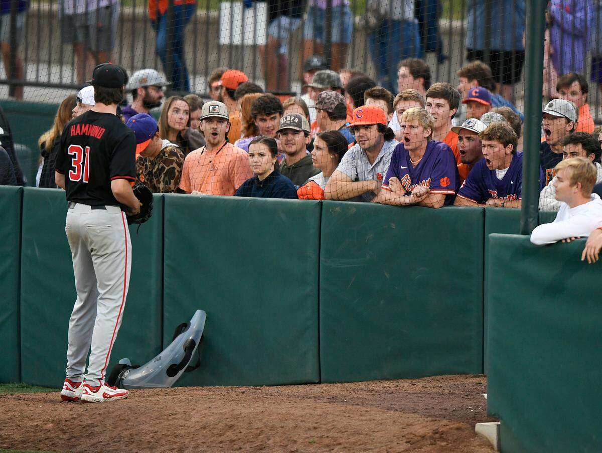 Clemson fans heckle Georgia pitcher Eric Hammond (31) as he warms up in the bullpen before the Tigers game against the Bulldogs Tuesday, April 22, 2025, at Clemson’s Doug Kingsmore Stadium.