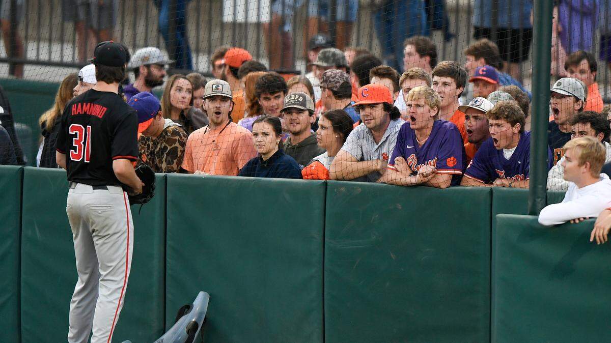 Clemson fans heckle Georgia pitcher Eric Hammond (31) as he warms up in the bullpen before the Tigers game against the Bulldogs Tuesday, April 22, 2025, at Clemson’s Doug Kingsmore Stadium.