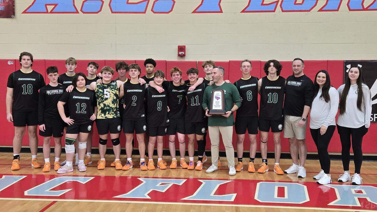 Catawba Ridge boys volleyball poses with the runner-up trophy at the 2025 SCHSL Class 5A Division II state championship.