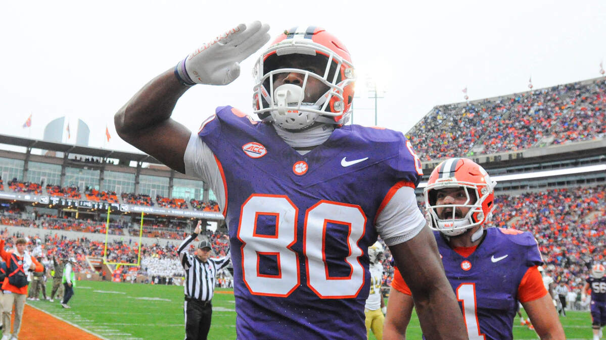 Clemson Tigers wide receiver Beaux Collins (80) salutes after scoring against the Georgia Tech Yellow Jackets during the second quarter at Memorial Stadium.