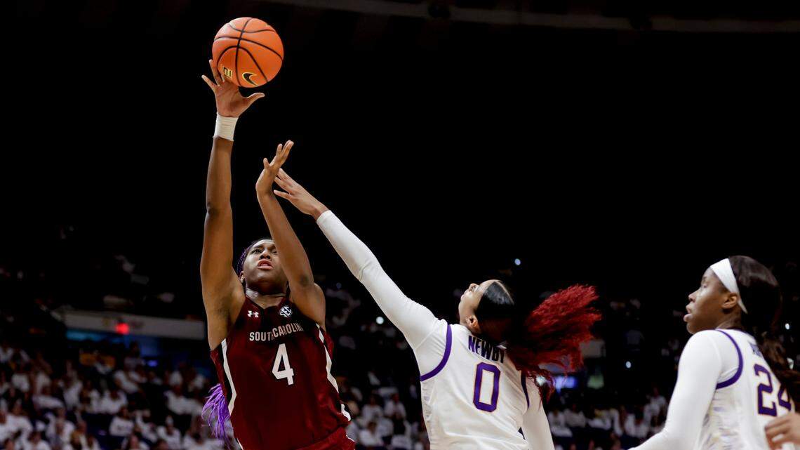 South Carolina forward Aliyah Boston (4) shoots over LSU forward Autumn Newby (0) in the second half of an NCAA college basketball game in Baton Rouge, La., Thursday, Jan. 6, 2022. (AP Photo/Derick Hingle)