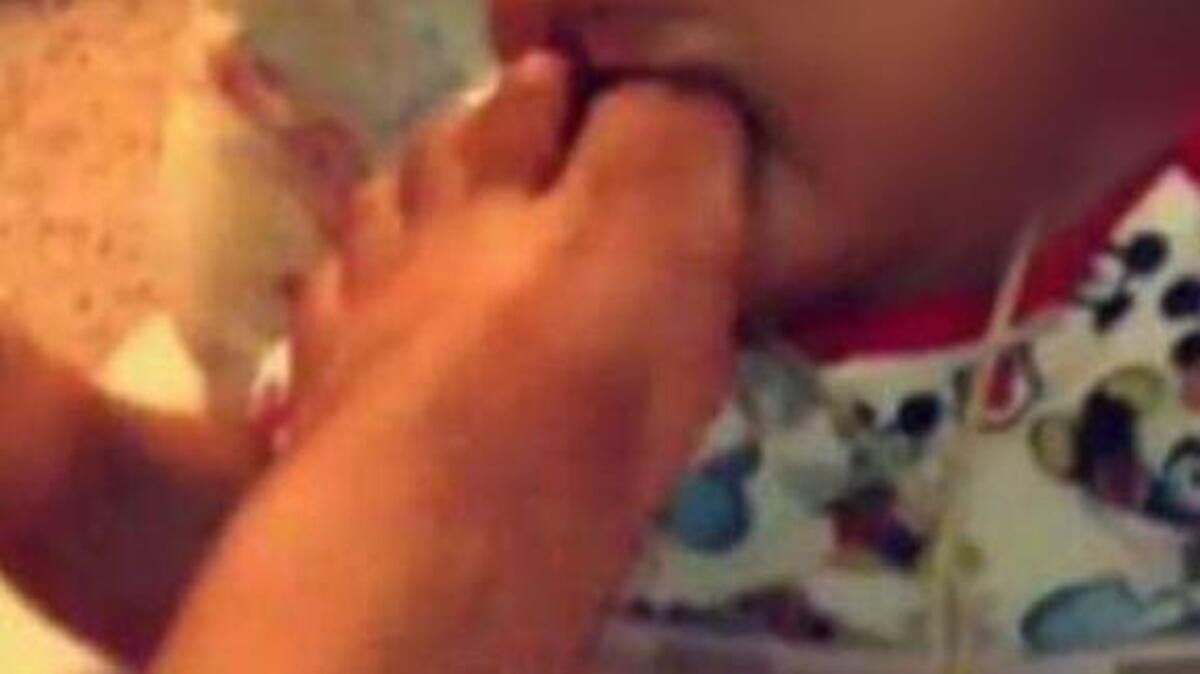 
Gaffney authorities are investigating this picture shared on social medial of a teenager sticking her toe into a 7-month-old baby’s mouth.
