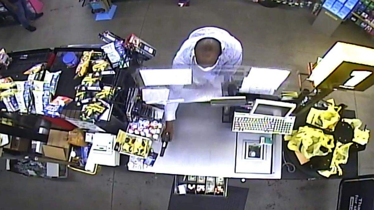 Security camera footage shows Deveon Belk robbing a convenience store. The footage was used to convict Belk of a series of robberies around the Columbia area.