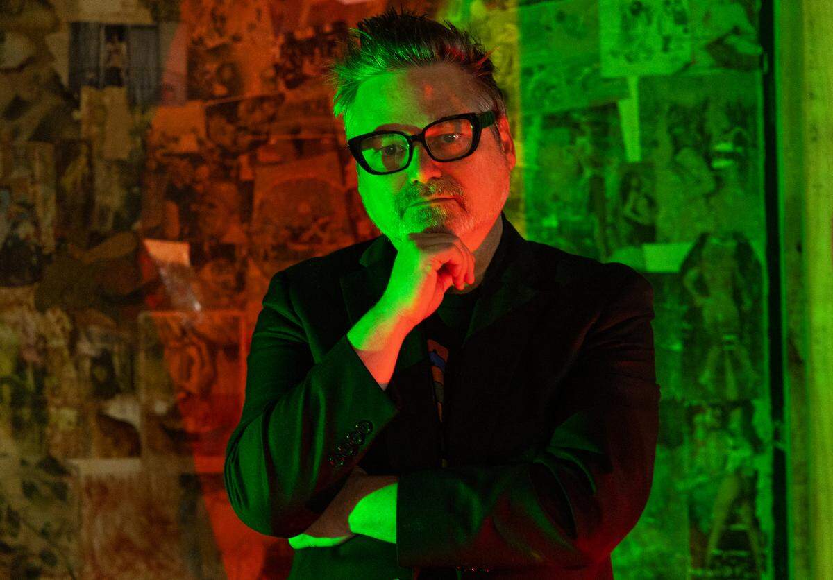 Christopher Bickel, director of the horror film Pater Noster and the Mission of Light, poses for a portrait at Papa Jazz Record Shoppe on Friday, November 15, 2024. His independent film follows Max, a record store clerk, on her mission to find a legendary Psychedelic Rock band’s commune, and the “grisly” consequences of finding it.