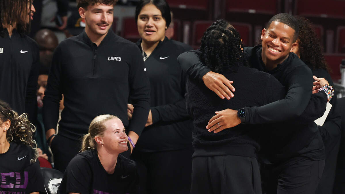 South Carolina head coach Dawn Staley greets her former assistant coach, Grand Canyon University's head coach Winston Gandy before the women's basketball game against Grand Canyon at Colonial Life Arena on Monday, Nov. 3, 2025.