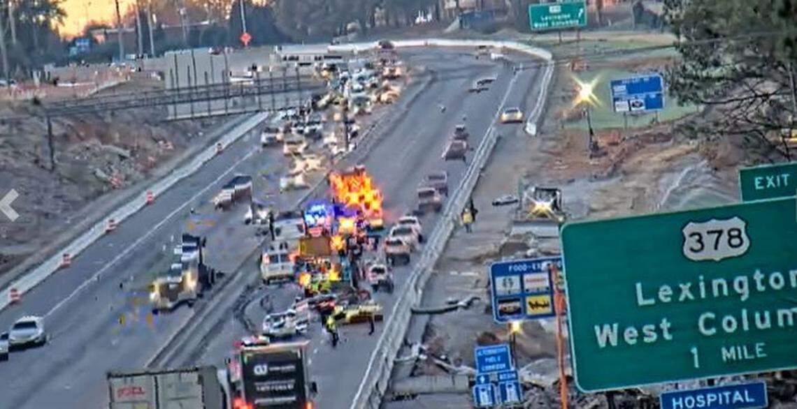 Emergency vehicles respond to a crash in the area near Malfunction Junction.