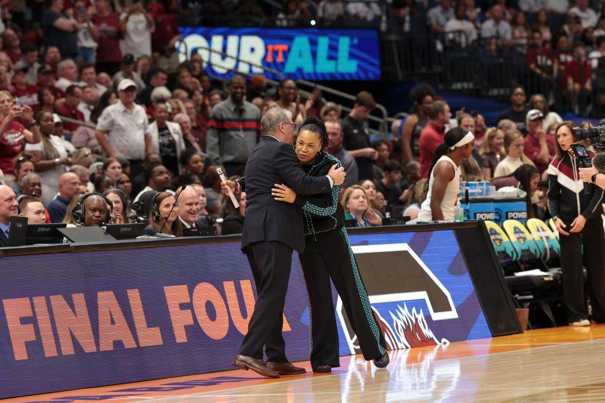 University of South Carolina Head Coach Dawn Staley and University of Connecticut’s Head Coach Geno Auriemma greet before the NCAA National Championship at Amalie Arena in Tampa, Fla. on Sunday, April 6, 2025.