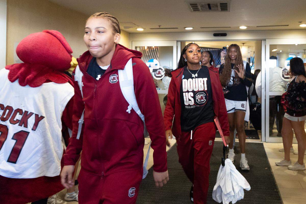 The South Carolina women’s basketball team are sent off from the downtown Columbia Marriott to their game against Tennessee Tech by cheering fans on Friday, March 21, 2025.