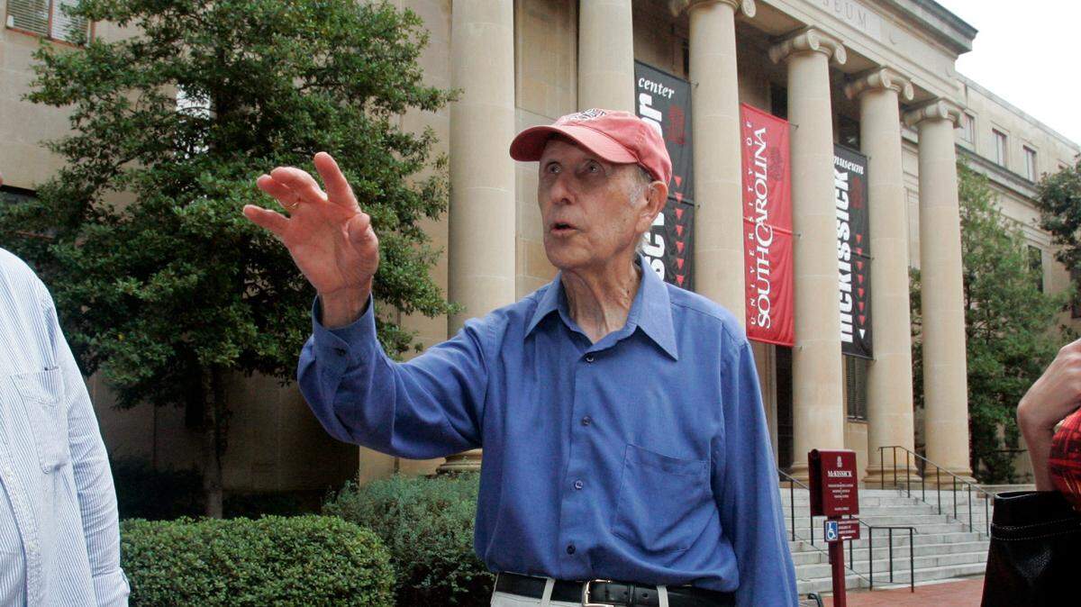 USC graduates from three generations, Gary Mills (class of ’80) Don Barton (class of ’49) and Tracy Bender (class of ’01) talk about their memories of their days on campus during a stroll through the Horseshoe, Thursday, October 28, 2010.Columbia, SC 10/28/10 Gerry Melendez/gmelendez@thestate.com