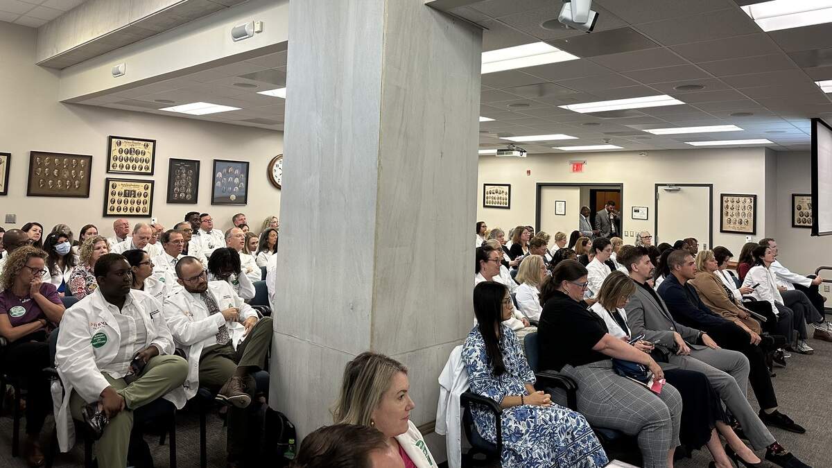 Attendees, including many in white coats, fill a state Senate subcommittee hearing room on Wednesday, Sept. 10, 2025. Senators heard testimony on several bills that would change rules for physician assistants and registered nurse practitioners.