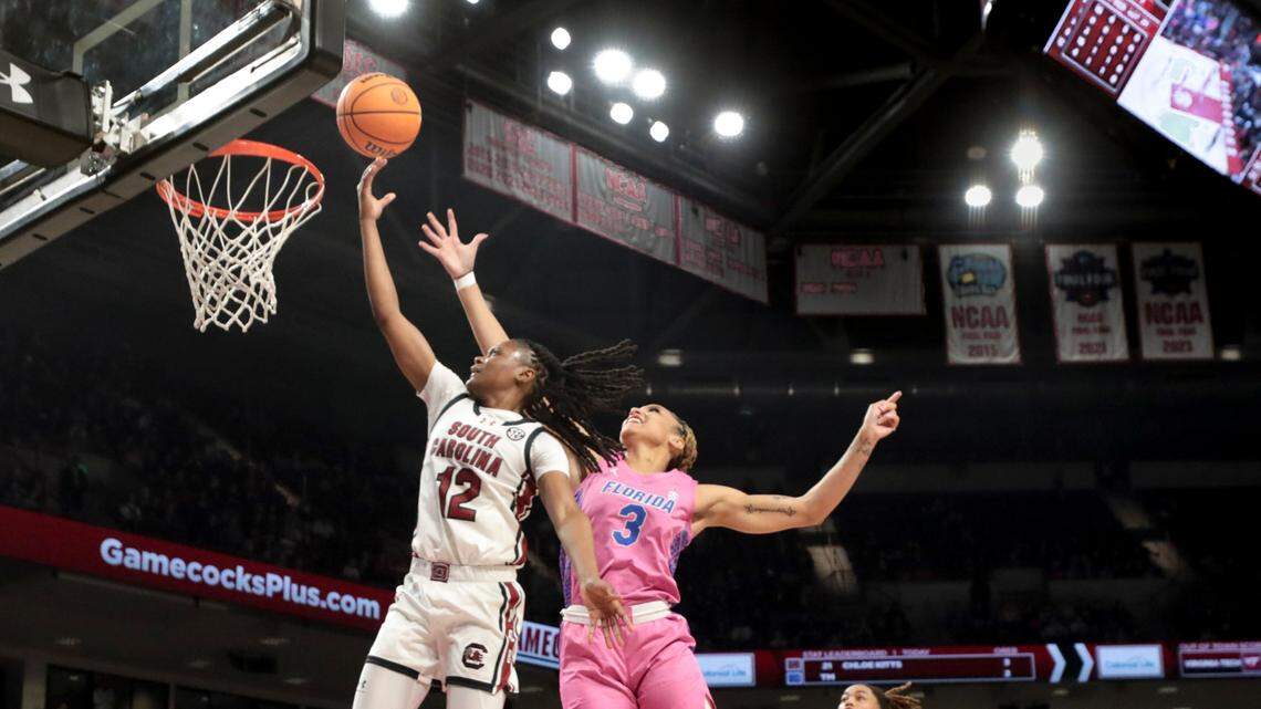 University of South Carolina’s MiLaysia Fulwiley (12) shoots as Florida’s Alexia Gassett (3) pressures during the first half of action in the Colonial Life Arena on Thursday, Feb. 13, 2025.