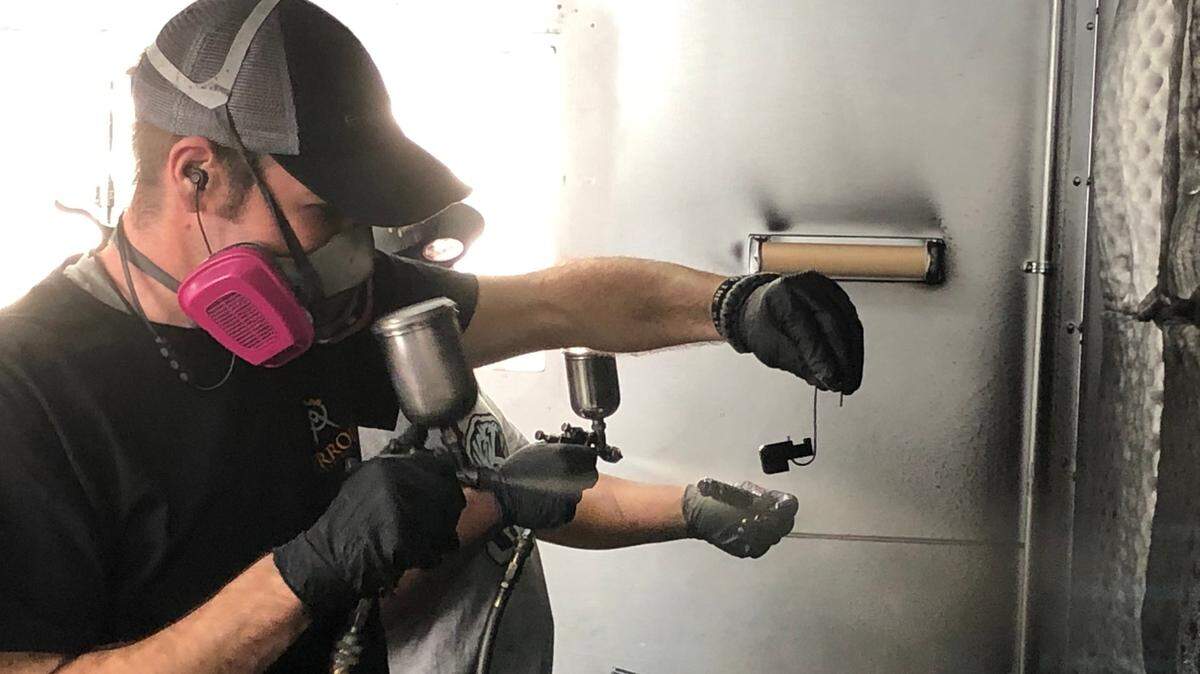 Workers at Palmetto State Armory apply teflon coating to firearm parts at the company’s Enterprise Parkway manufacturing facility. The armory will soon move some of its operations to an expanded site at the former Akebono brake manufacturer on Metropolitan Drive.