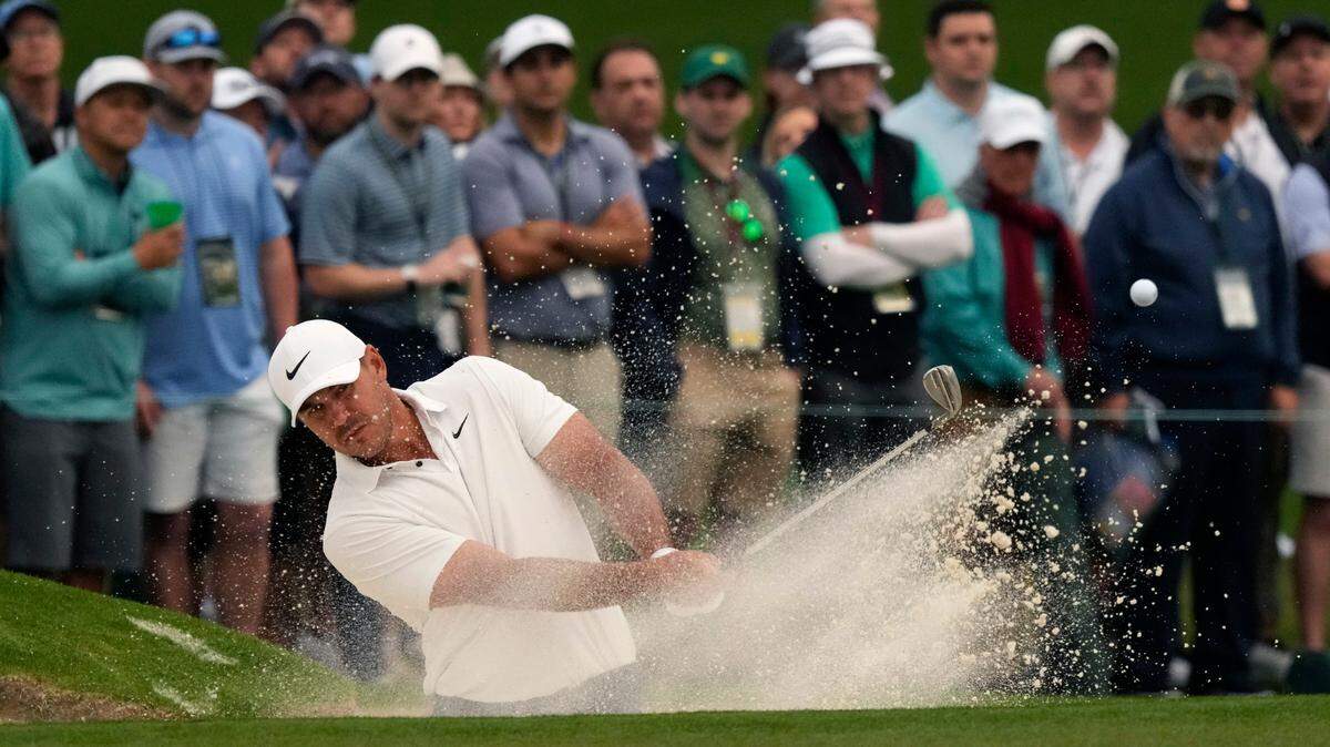 Brooks Koepka plays a shot from a bunker on the second hole during the second round of The Masters golf tournament.