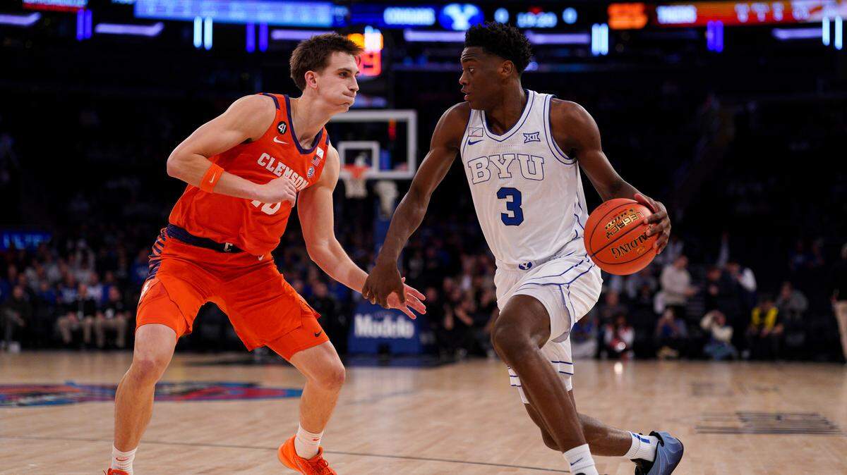 AJ Dybantsa #3 of the BYU Cougars drives to the basket as Jake Wahlin #10 of the Clemson Tigers defends at Madison Square Garden on Tuesday.