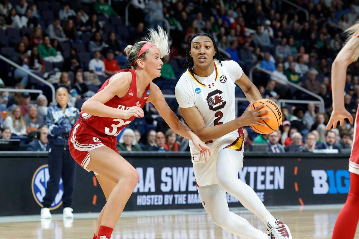 South Carolina’s Ashlyn Watkins (2) drives by Indiana’s Sydney Parrish (33) during the second half of action in the Sweet 16 round of the NCAA Tournament at the MVP Arena in Albany, NY on Friday, March. 29 2024.
