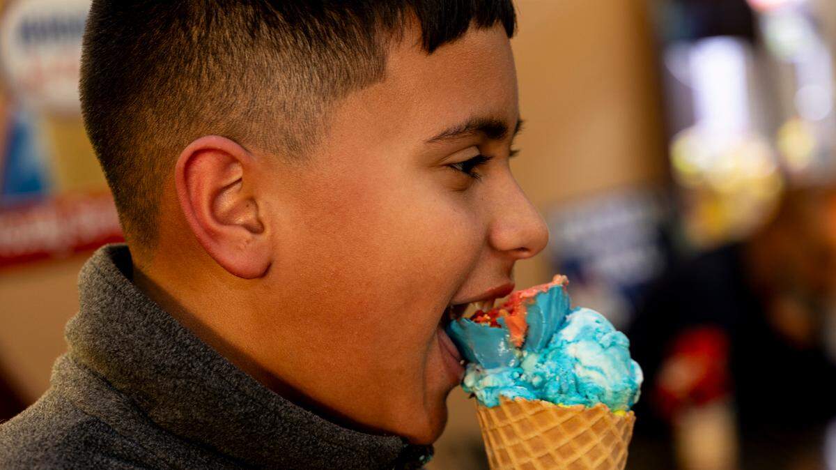 Henry Barrera enjoys an ice cream cone at IceCream Taco in Three Fountains.